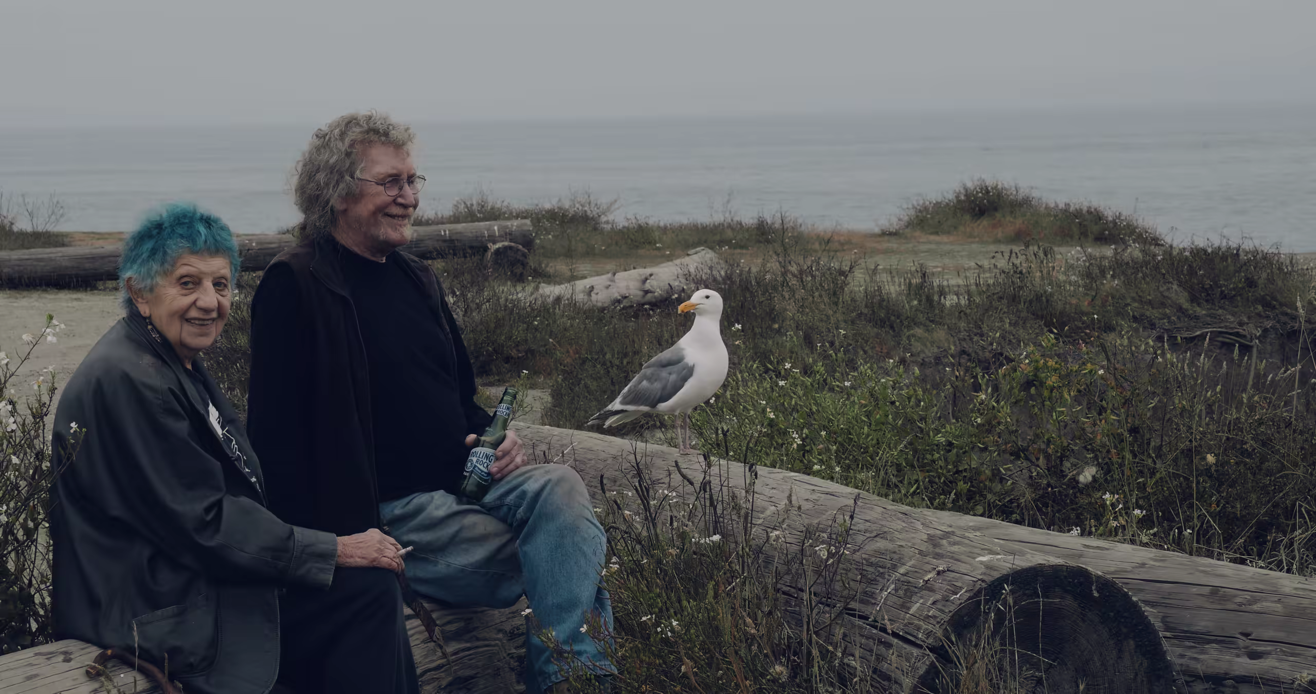 ruth weiss and Hal Davis by the sea with a gull