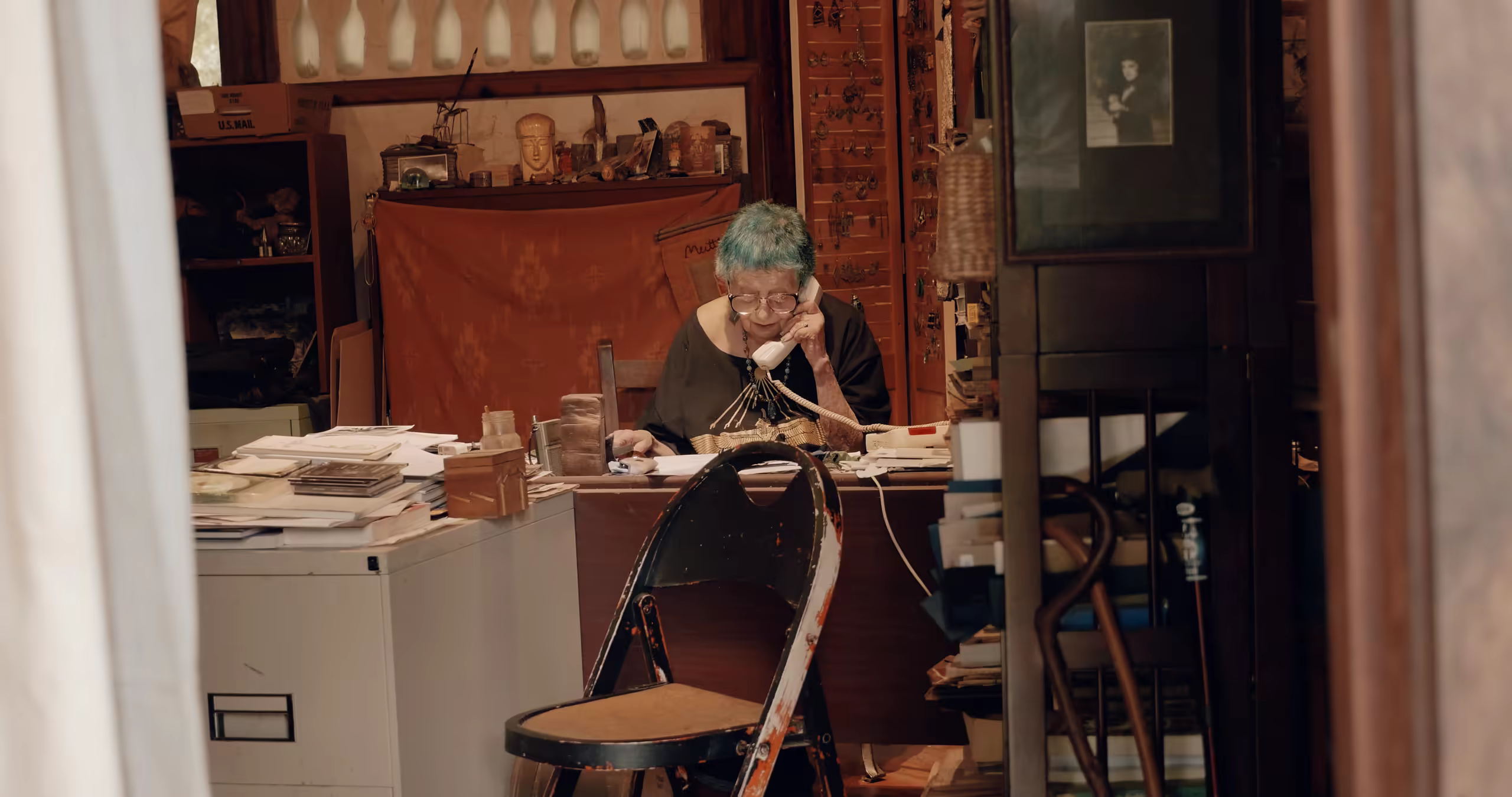 ruth weiss on the telephone in her studio